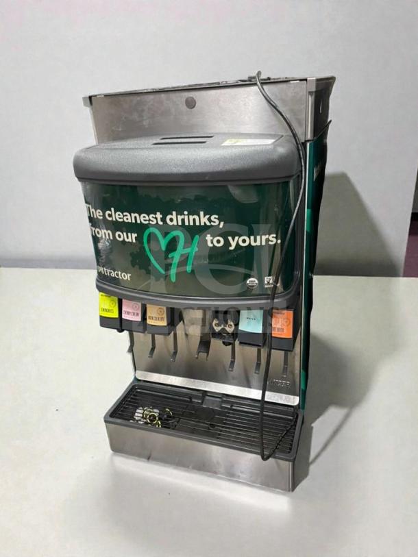 Flawless Tractor Beverage Co. juice dispenser, model TRC-M-JCE-0023, 115V, multi-flavor, fully tested, excellent condition.