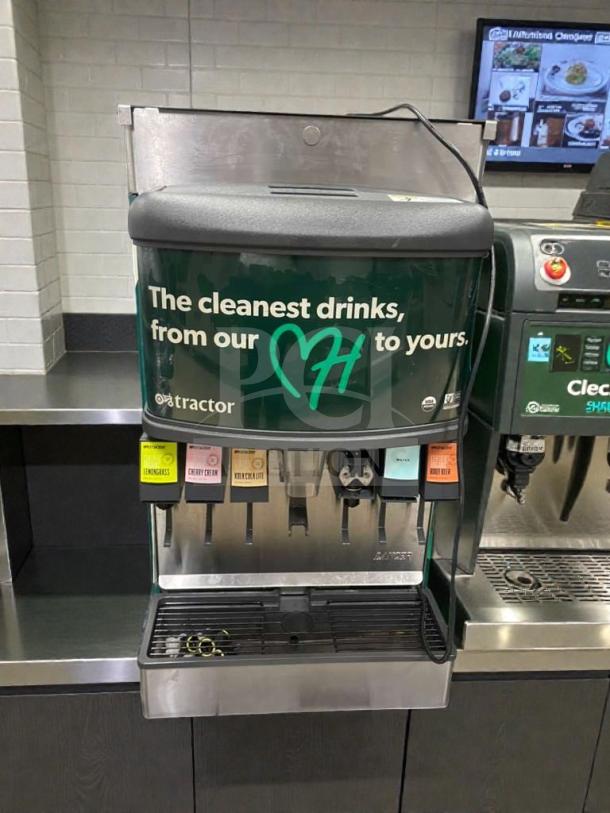 Flawless Tractor Beverage Co. multi-flavor juice dispenser, model TRC-M-JCE-0023, 115V, tested and working, green branding.