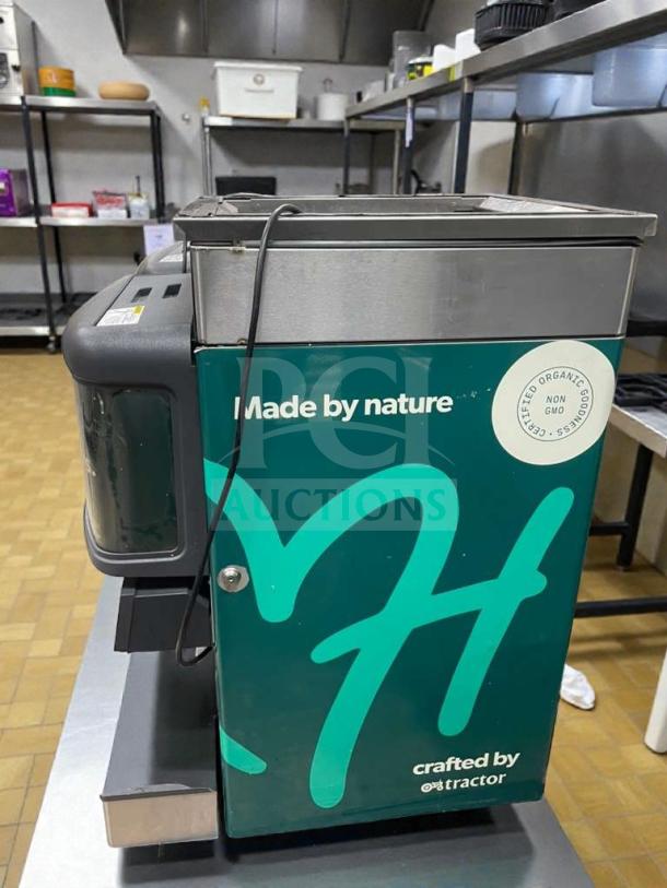 Flawless Tractor Beverage Co. Commercial Juice Dispenser, 115V, multi-flavor, crafted by Tractor, non-GMO label. Model: TRC-M-JCE-0023.