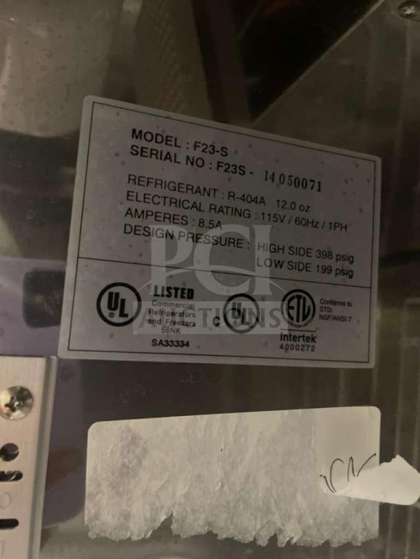 Label on Nor-Lake AdventEDGE F23-S freezer indicates model, refrigerant type, electrical rating, and UL certification.