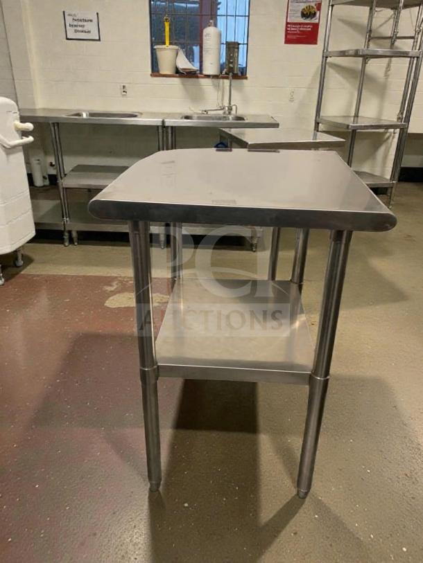Stainless steel commercial prep table in superb condition, heavy-duty, fully inspected, features undershelf for storage.