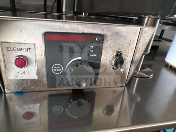 Keating Miraclean® 36" gas griddle controls; features ON/OFF switch, temperature dial, operational indicator light.