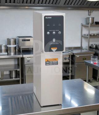 BUNN 39100.0000 H5E-DV PC 5-gallon commercial hot water dispenser, excellent condition, dual voltage, fully tested, warning label visible.
