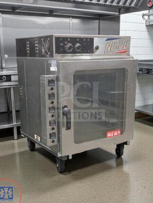 Nu-Vu RM-5T convection oven with mobile stand; stainless steel, 208V/3 phase, excellent condition, fully tested.