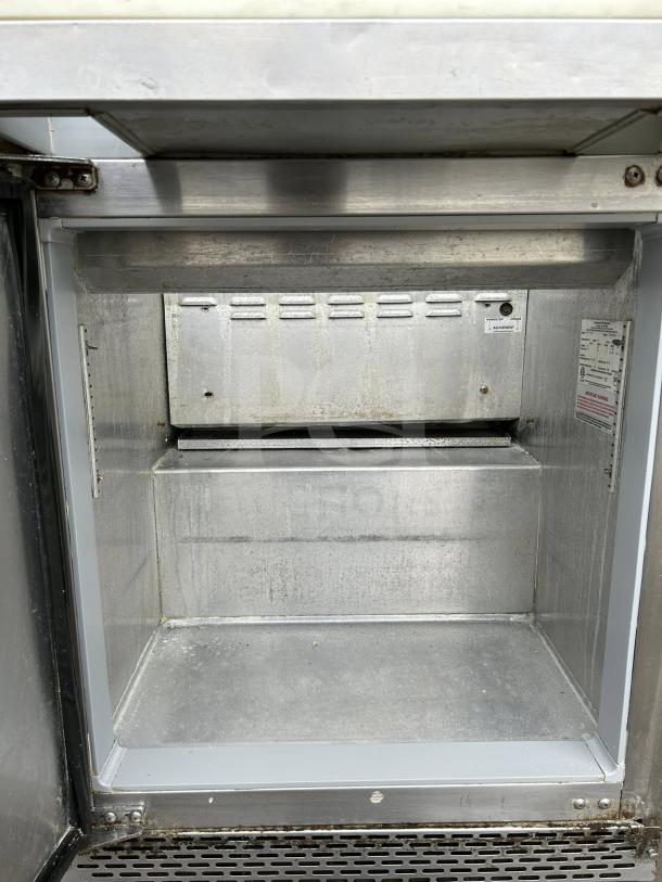 Continental SW27-12M refrigerated sandwich prep unit, 27" wide, 7.4 Cu. Ft., stainless steel, UL & NSF listed, fully tested.