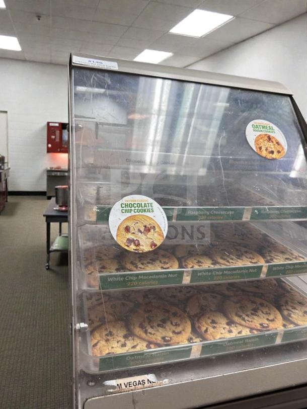 Commercial Bakery Display Countertop Multi-Tier Case, exceptional condition, fully operational, with cookie labels and clear front.