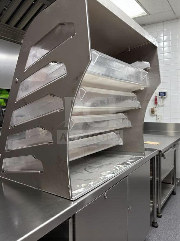 Commercial Bakery Display Case, multi-tier countertop model, exceptional condition, fully tested, stainless steel finish.