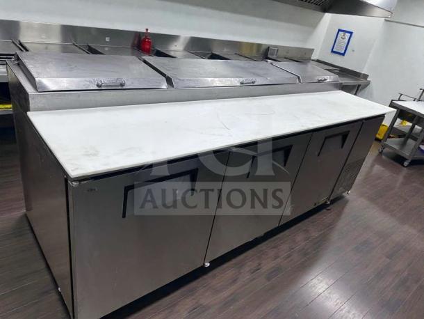 Pristine 93” True TPP-93 pizza prep table with 3 doors, cutting board top; fully tested, operational, and in excellent condition.