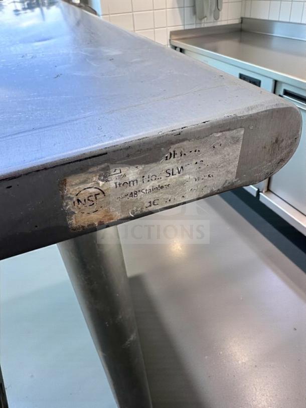 Stainless steel work table, 48"x24", with undershelf, NSF certified, tested. Slight wear, suitable for commercial use.