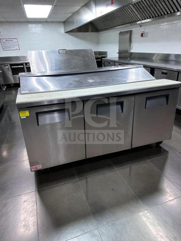 True TSSU-72-18 refrigerated prep table, 72", 3-door, in high-grade condition. NSF & UL listed, 115V, fully tested.