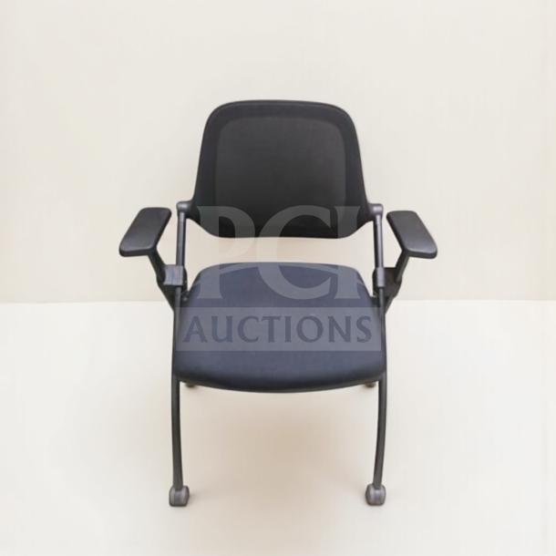 Stackable training chair with arms, mesh back, and sled base by Commercial Institutional Furniture. Fully inspected, commercial grade.