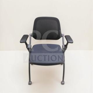 Stackable training chair with arms, mesh back, and sled base by Commercial Institutional Furniture. Fully inspected, commercial grade.