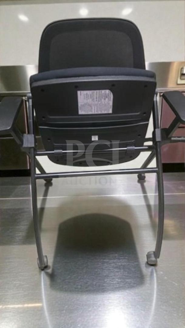 Stackable training chair with arms by Commercial Institutional Furniture. Sled base, fully inspected, commercial grade.