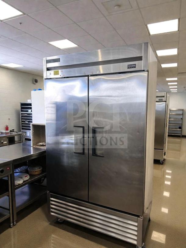 Commercial grade two-door reach-in refrigerator, stainless steel, bottom-mount, immaculate condition, model REF-L-2DR-0472.