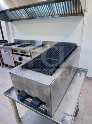 Commercial Grade 24" stainless steel gas charbroiler, outstanding condition, fully tested, featuring dual control knobs.