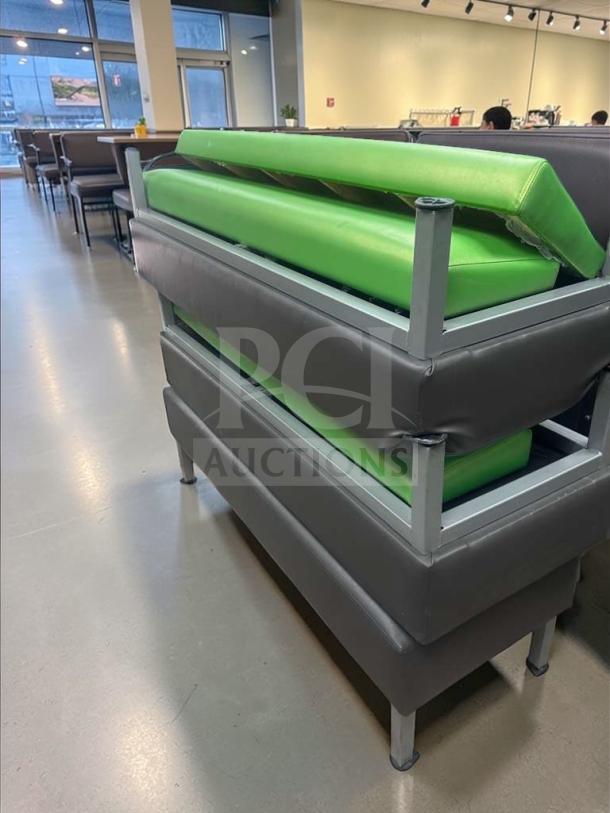 Commercial restaurant booth seating, upholstered vinyl cushions in green, heavy-duty frame, superb condition, inspected.
