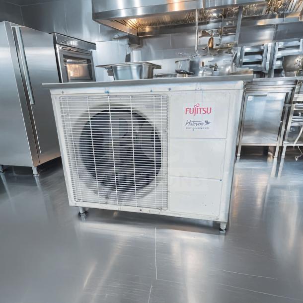 Elite condition Fujitsu AUU24RLB air conditioner, 24,000 BTU, outdoor condenser unit, 208/230V, fully tested, visible branding.