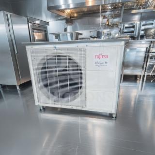 Elite condition Fujitsu AUU24RLB air conditioner, 24,000 BTU, outdoor condenser unit, 208/230V, fully tested, visible branding.