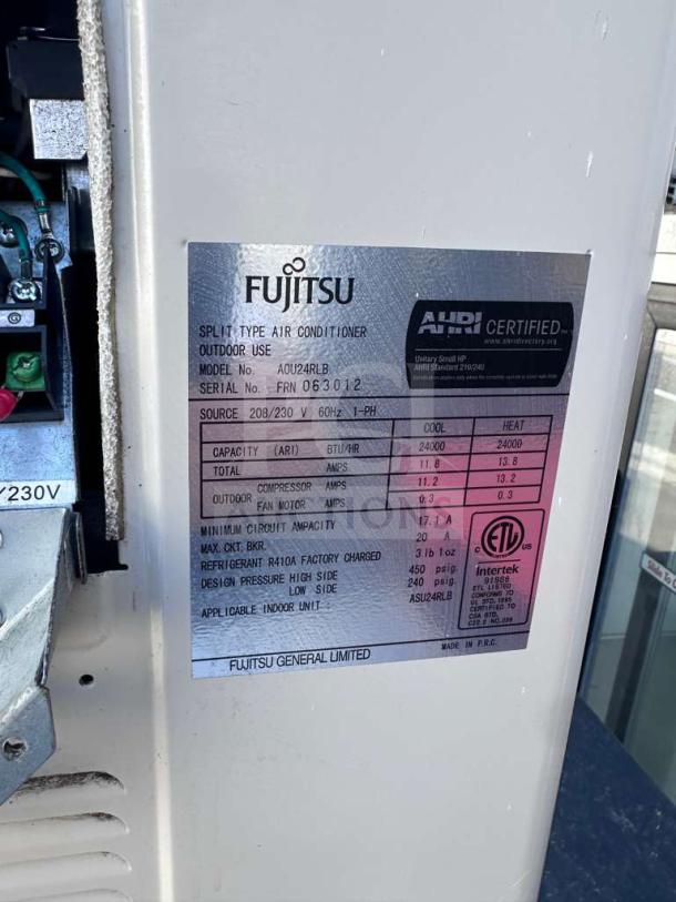 Fujitsu AUU24RLB split system air conditioner, 24,000 BTU, outdoor unit, 208/230V, AHRI certified, fully operational.