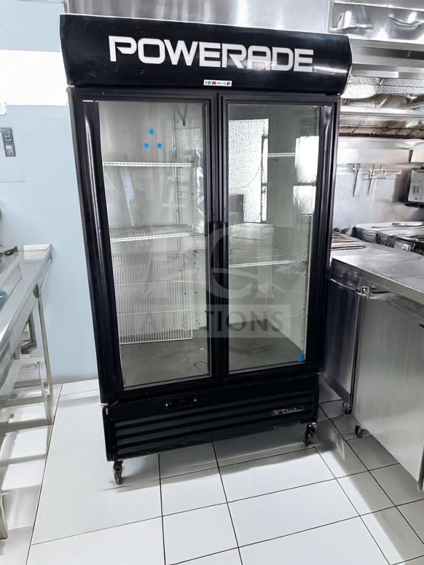 True GDM-43EM commercial glass door merchandiser refrigerator, 2-door, black, excellent condition, 115V, fully operational.