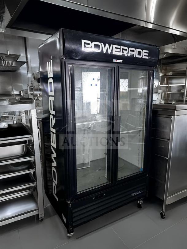 True GDM-43EM commercial glass door merchandiser, 2-door, exceptional condition, 115V, fully tested, Powerade branding.