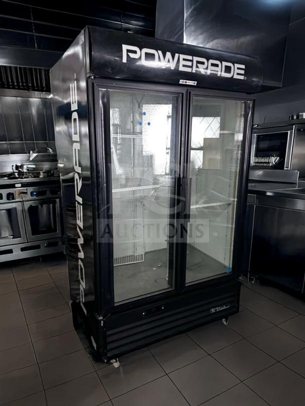 True GDM-43EM commercial glass door merchandiser refrigerator, two-door, black, 115V, branded "Powerade," fully tested.
