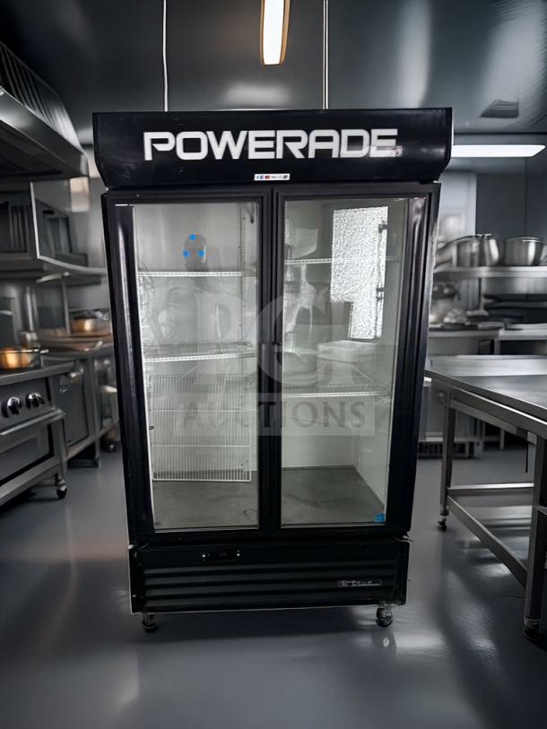 True GDM-43EM commercial glass door merchandiser refrigerator, 2-door display cooler, Powerade branding, excellent condition.
