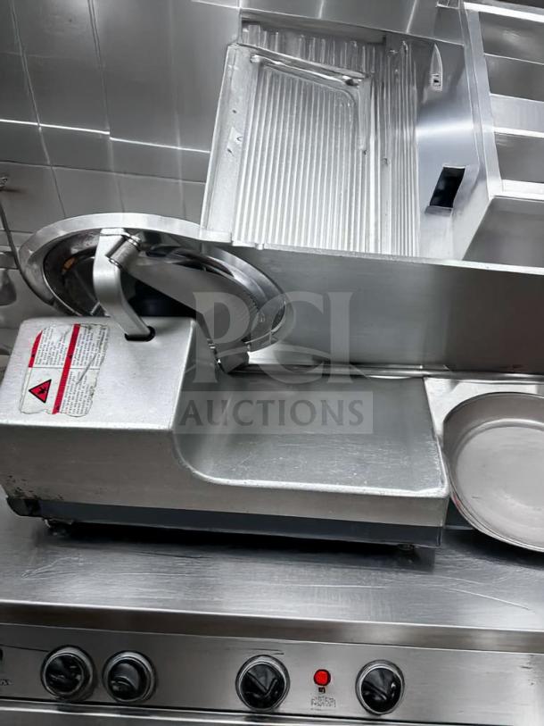 Bizerba GSP HD commercial automatic meat slicer in pristine condition. Heavy-duty, fully tested, 120V, durable design.