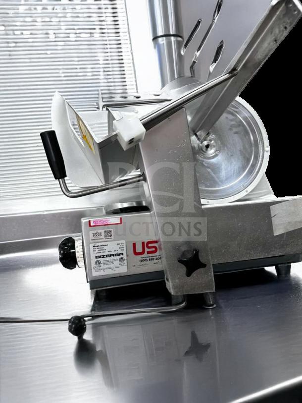 Pristine Bizerba GSP HD commercial meat slicer, heavy-duty, 120V, fully operational. Visible Bizerba label with model details.