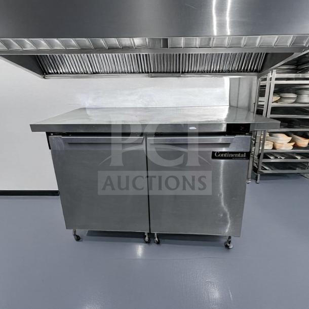 Stainless steel Continental commercial refrigerated chef base, 48" wide, excellent condition, fully operational, visible branding.