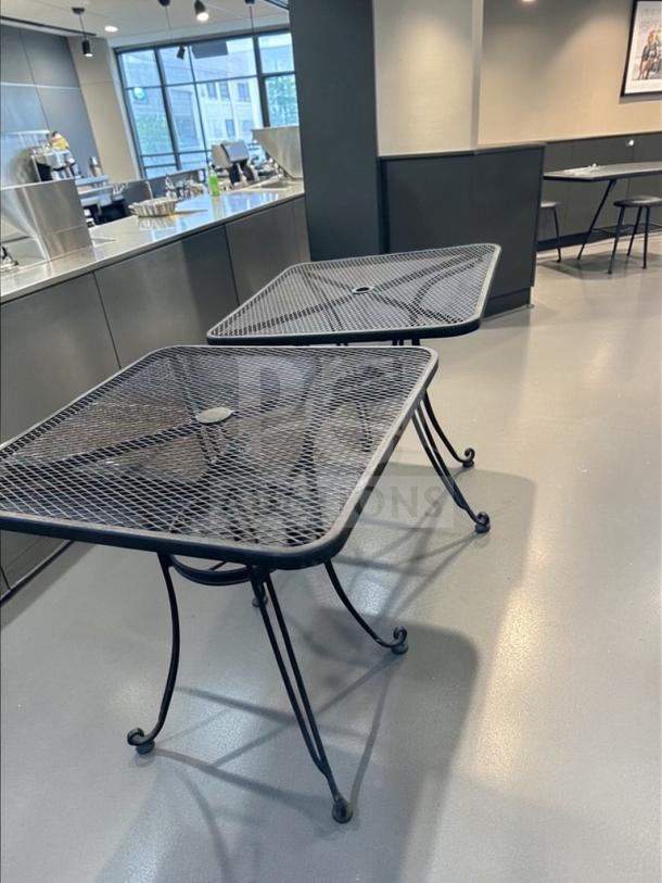 Commercial outdoor metal patio table, 32” square mesh top, black, umbrella hole, excellent condition, heavy-duty construction.