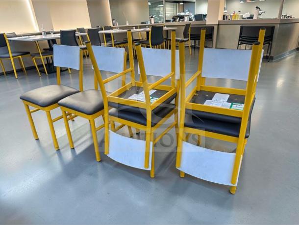 Commercial restaurant dining chairs with upholstered seat and back, heavy-duty metal frame, inspected, model FUR-M-CHR-0583.