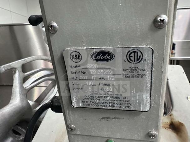 Flawless Globe SP20 planetary mixer, 20 Qt, 1/2 HP, 115V, NSF certified. Label shows model and specifications. Fully tested.