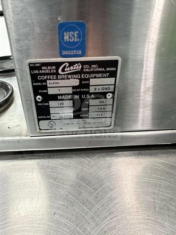 Wilbur Curtis Alpha AP-1D coffee brewer, 120V, NSF certified. Label shows model and serial number. Excellent condition.