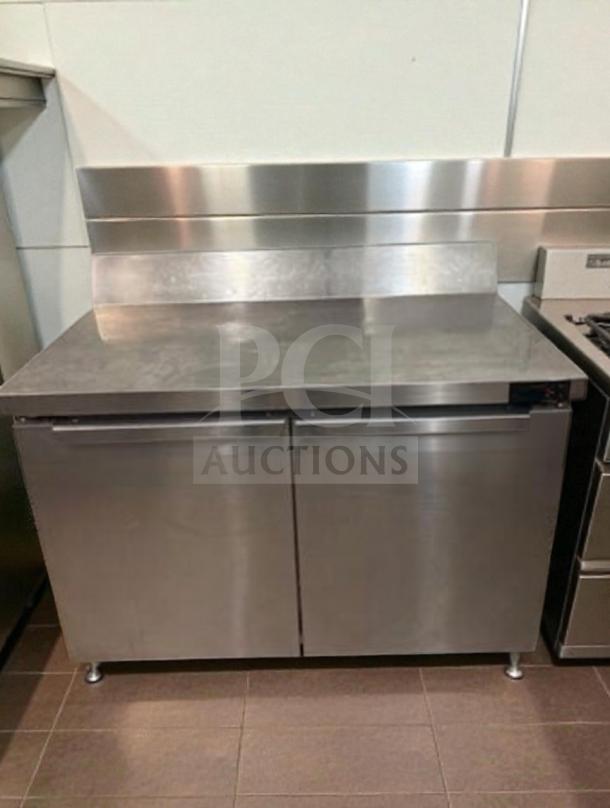 Continental two-door stainless steel undercounter worktop refrigerator, prime condition, fully tested, ideal for kitchens.