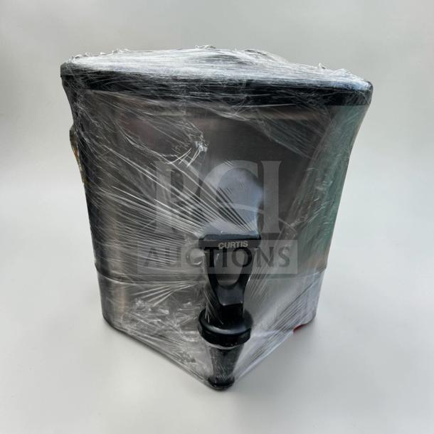 Flawless Curtis beverage dispenser, stainless steel, large capacity, wrapped for protection. Model CUR-S-BEV-0661.