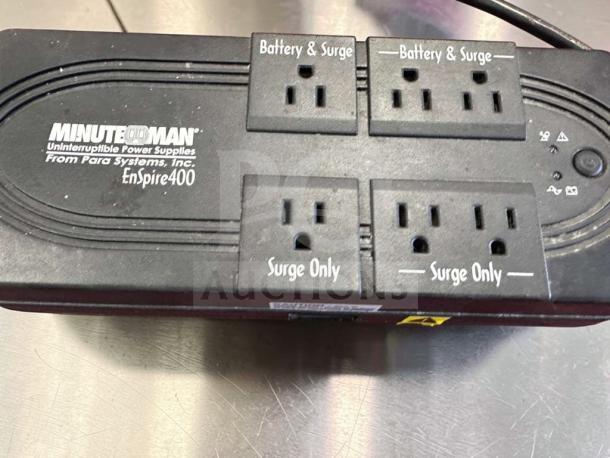 Minuteman EnSpire 400 UPS, 6-outlet, battery backup and surge protection. High-quality condition, model UPS-S-MINUTE-0689.