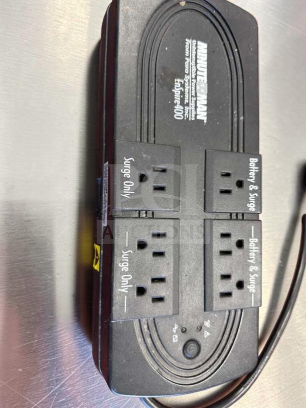 Minuteman EnSpire 400 UPS Battery Backup & Surge Protector, 6 outlets, 400VA capacity, black, like new condition.