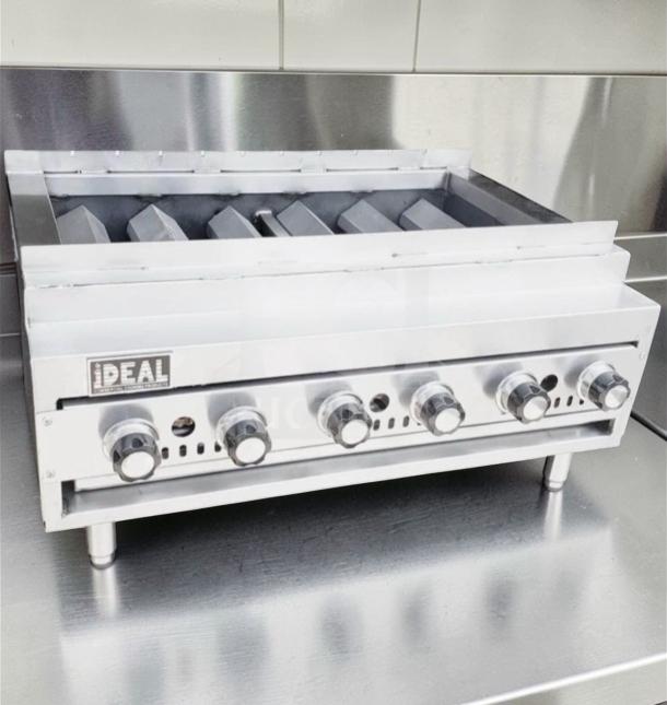 IDEAL 36" 6-burner gas charbroiler grill in excellent condition, model 48". Features heavy-duty knobs and radiant char grill.