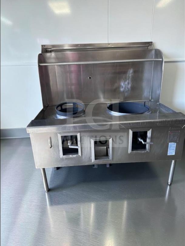 "Atosa Dual Wok Range in top-tier condition, featuring two burners and stainless steel construction, model ATO-L-RNG-0695."