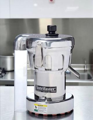 Nutrifaster N450 Commercial Juicer in elite condition. Heavy-duty stainless steel, fully tested, high-performance juice extractor.