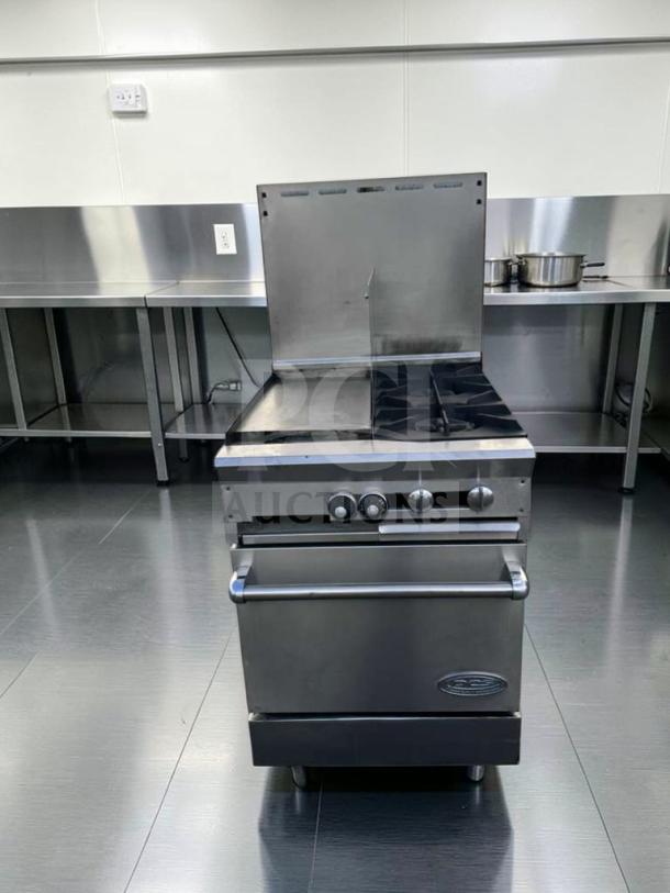 Southbend stainless steel commercial gas range with griddle, burners, and oven base. Superior condition, fully tested.