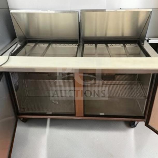 True TSSU-48-12-HC refrigerated sandwich prep table, stainless steel, 48-inch, excellent condition, made in USA.