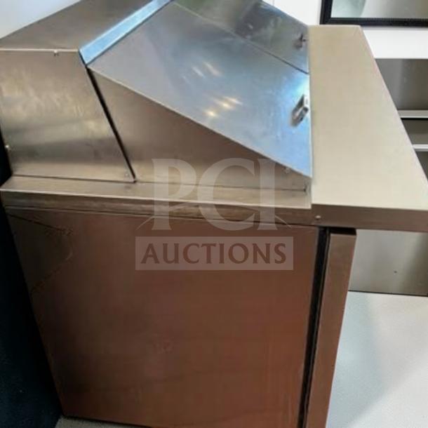 True TSSU-48-12-HC refrigerated sandwich prep table, stainless steel, 48", commercial, fully operational, made in USA.
