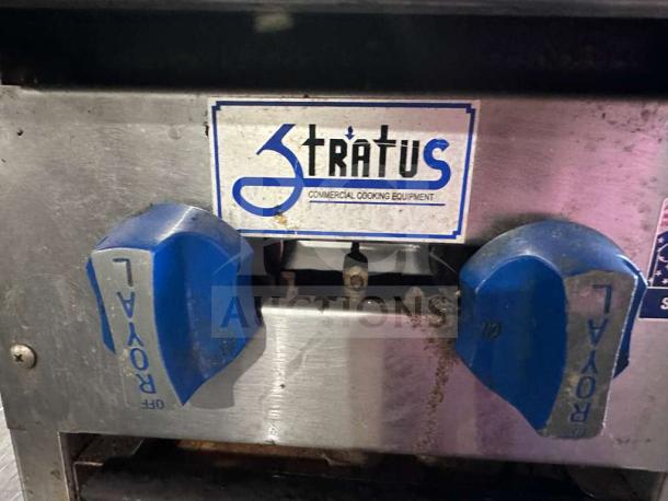 Stratus Commercial 2-Burner Gas Hot Plate with heavy cast iron grates, blue control knobs, and ETL listing sticker.