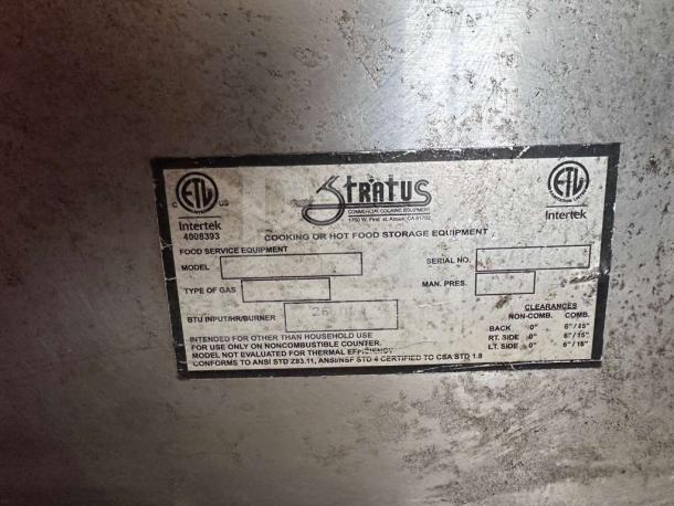 Stratus Commercial 2-Burner Gas Hot Plate label, showing ETL certification and model details, in operational condition.
