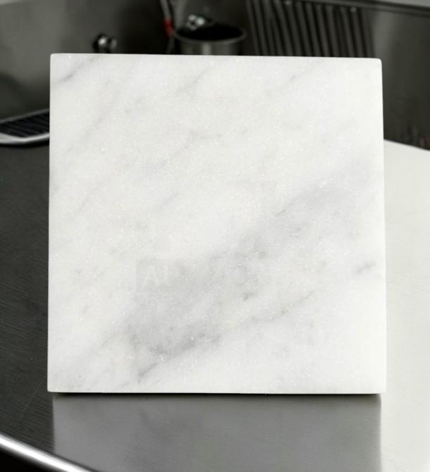 Carrara Marble 4x4 honed tile, white with light gray veining, in outstanding condition. Ideal for interior walls and backsplashes.