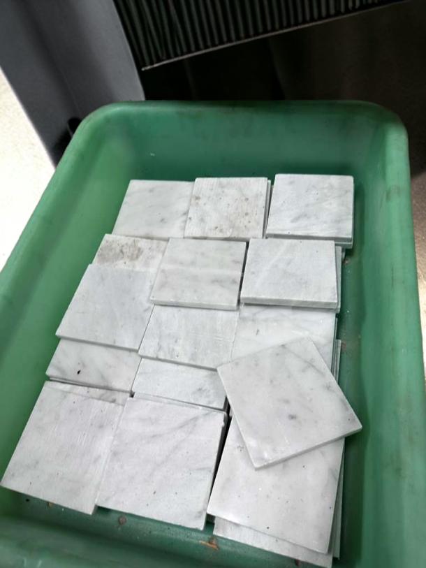 Carrara Marble 4x4 Honed Tiles in green container, outstanding condition, natural stone for interior walls and backsplashes.