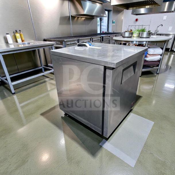 Superior condition True TUC-27F-LP-HC undercounter freezer, left hinge, stainless steel, 27", fully tested, commercial use.