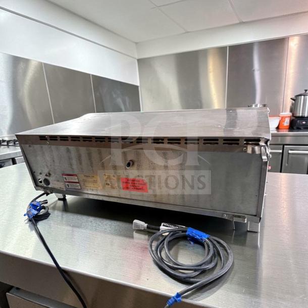 Alt text: Equipex Sodir PZ-4302D countertop pizza deck oven, stainless steel, tested, operational, voltage 208–240V, rear view.